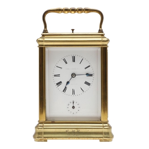 1140 - A LARGE MID 19TH CENTURY BRASS REPEATING CARRIAGE CLOCK. the Roman numeral dial with subsidiary alar... 