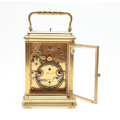 1140 - A LARGE MID 19TH CENTURY BRASS REPEATING CARRIAGE CLOCK. the Roman numeral dial with subsidiary alar... 