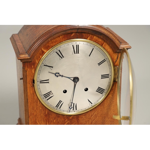 1142 - AN OAK CASED WINTERHALDER & HOFMEIER BRACKET CLOCK. early 20th century, the 7 3/4