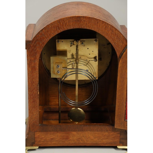 1142 - AN OAK CASED WINTERHALDER & HOFMEIER BRACKET CLOCK. early 20th century, the 7 3/4