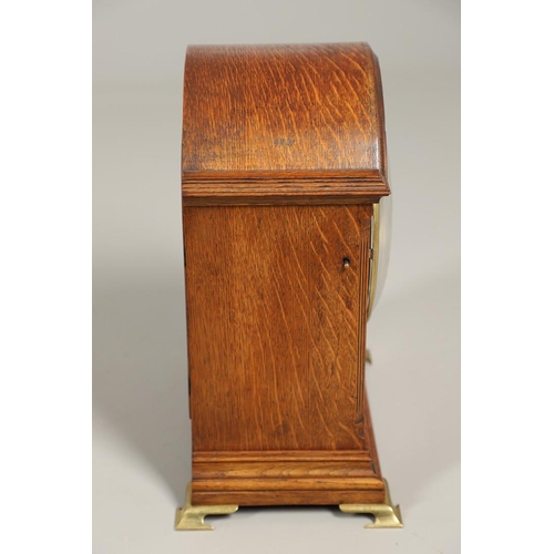 1142 - AN OAK CASED WINTERHALDER & HOFMEIER BRACKET CLOCK. early 20th century, the 7 3/4