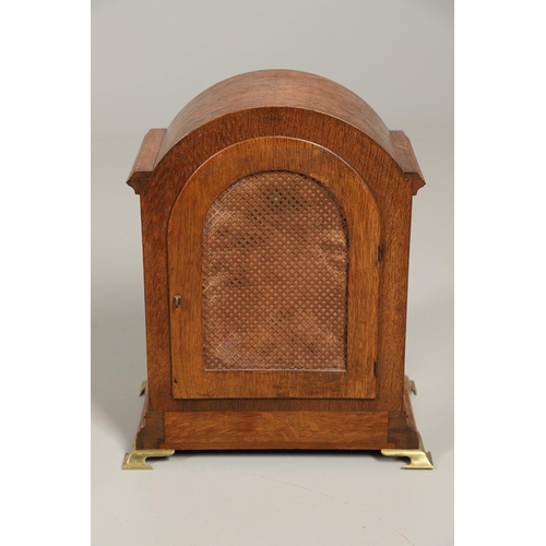 1142 - AN OAK CASED WINTERHALDER & HOFMEIER BRACKET CLOCK. early 20th century, the 7 3/4