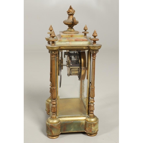 1157 - A FRENCH ONYX FOUR GLASS MANTEL CLOCK. late 19th century, the painted dial with ornate brass chasing... 