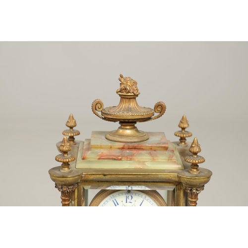 1157 - A FRENCH ONYX FOUR GLASS MANTEL CLOCK. late 19th century, the painted dial with ornate brass chasing... 