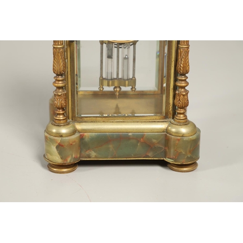 1157 - A FRENCH ONYX FOUR GLASS MANTEL CLOCK. late 19th century, the painted dial with ornate brass chasing... 