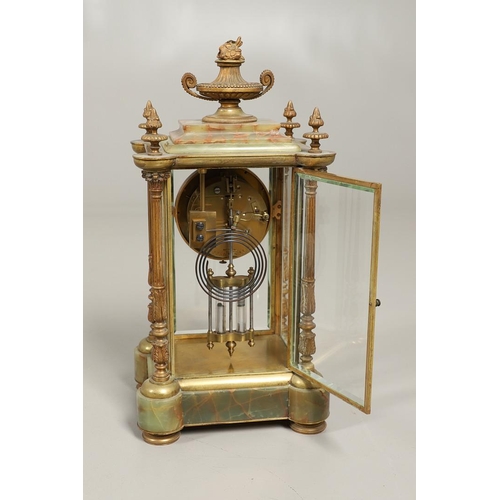 1157 - A FRENCH ONYX FOUR GLASS MANTEL CLOCK. late 19th century, the painted dial with ornate brass chasing... 