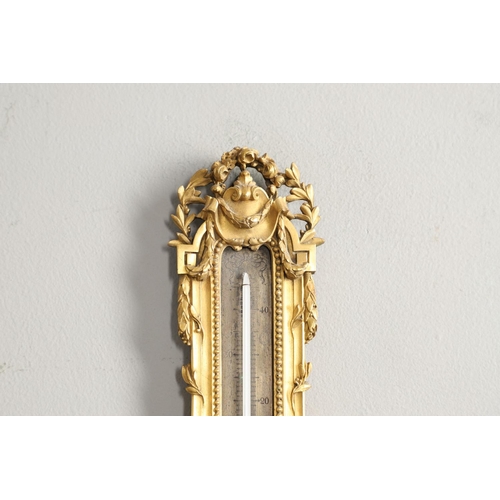 1158 - A 19TH CENTURY LOUIS XV STYLE ORMOLU WALL THERMOMETER. the brass dial engraved with cornucopia, sign... 