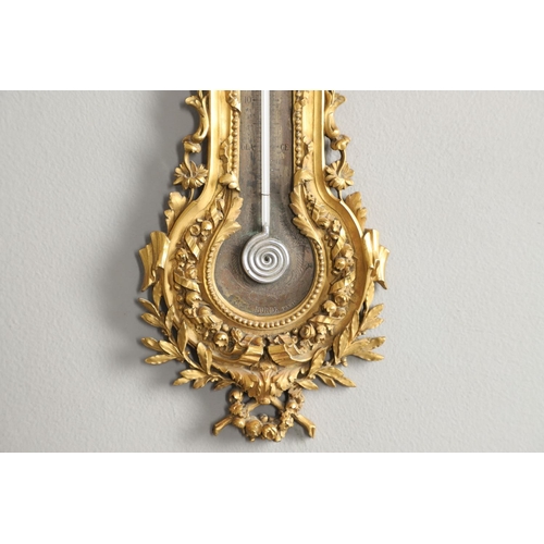 1158 - A 19TH CENTURY LOUIS XV STYLE ORMOLU WALL THERMOMETER. the brass dial engraved with cornucopia, sign... 