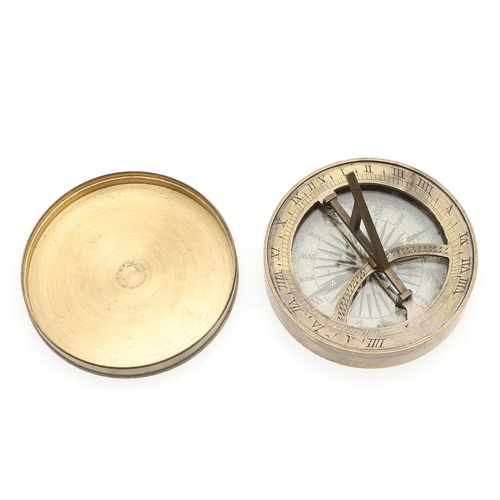 1162 - AN EARLY 19TH CENTURY BRASS POCKET SUNDIAL COMPASS. by William Simms (1793 - 1860), the circular cas... 