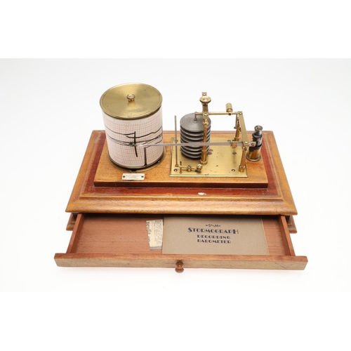 1164 - AN OAK CASED 'STORMOGRAPH' BAROGRAPH. by Short & Mason of London, in an oak case with cylindrical dr... 