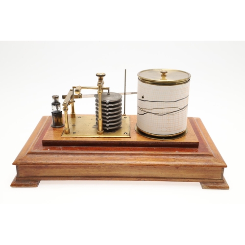 1164 - AN OAK CASED 'STORMOGRAPH' BAROGRAPH. by Short & Mason of London, in an oak case with cylindrical dr... 