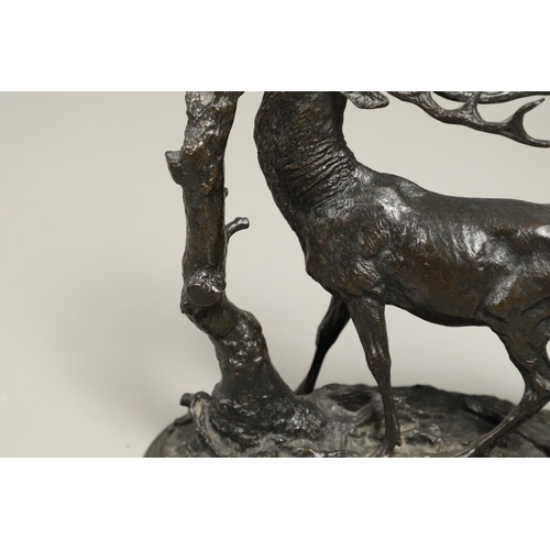 1168 - A COALBROOKDALE BRONZE OF A STAG. late 19th/ early 20th century, the stag naturalistically modelled ... 