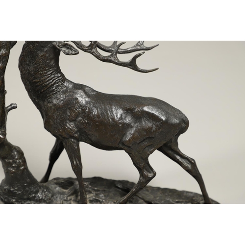 1168 - A COALBROOKDALE BRONZE OF A STAG. late 19th/ early 20th century, the stag naturalistically modelled ... 