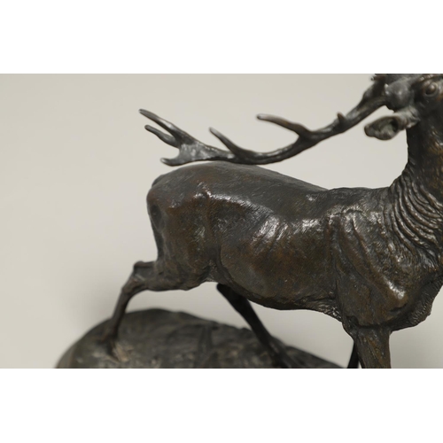 1168 - A COALBROOKDALE BRONZE OF A STAG. late 19th/ early 20th century, the stag naturalistically modelled ... 