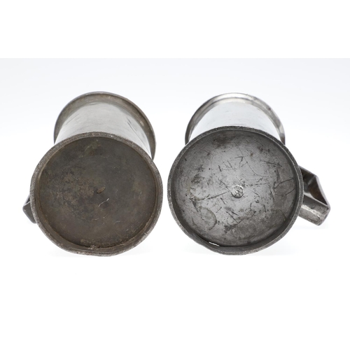 1174 - TWO MID-LATE 19TH CENTURY FRENCH PEWTER LIDDED MEASURES. of double and single litre size, the talles... 