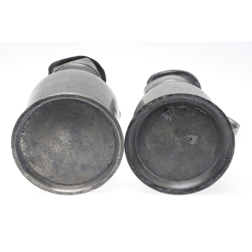 1174 - TWO MID-LATE 19TH CENTURY FRENCH PEWTER LIDDED MEASURES. of double and single litre size, the talles... 