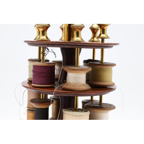 1176 - A LATE 19TH CENTURY MAHOGANY AND BRASS COTTON REEL HOLDER. the two tiers holding 12 cotton reels on ... 