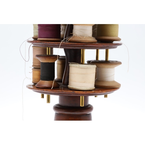 1176 - A LATE 19TH CENTURY MAHOGANY AND BRASS COTTON REEL HOLDER. the two tiers holding 12 cotton reels on ... 