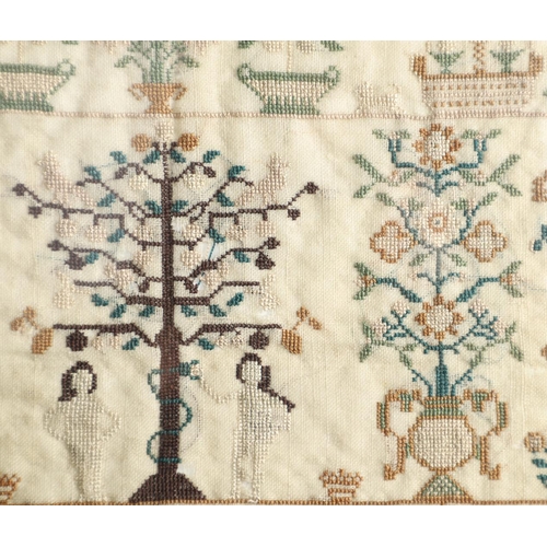 1180 - AN EARLY 19TH CENTURY PICTORIAL NEEDLEWORK SAMPLER. illustrating Adam and Eve in the Garden of Eden,... 