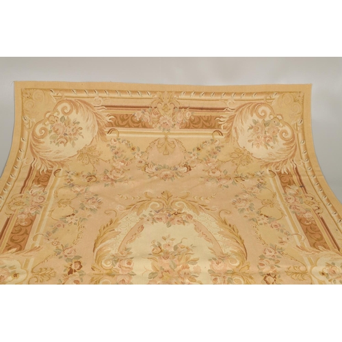 1185 - AN AUBUSSON TYPE TAPESTRY WALL HANGING. 20th century, with central floral medallion and all over pin... 