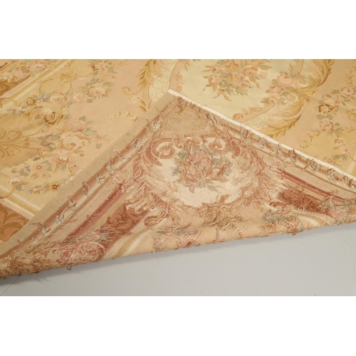 1185 - AN AUBUSSON TYPE TAPESTRY WALL HANGING. 20th century, with central floral medallion and all over pin... 