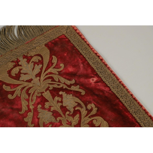 1189 - AN EARLY RED VELVET ITALIAN TABLE RUNNER. possibly 17th century, with 'gold' Florentine braiding of ... 