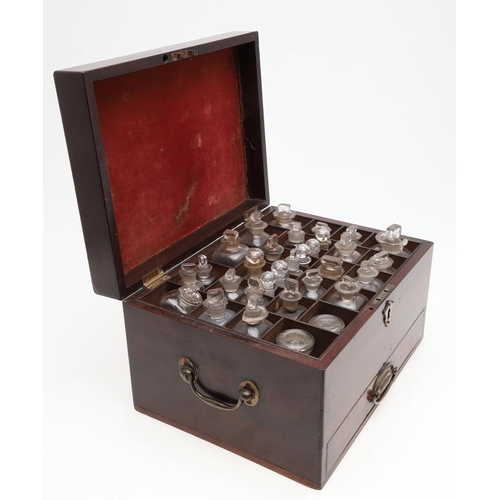 1191 - AN EARLY 19TH CENTURY MAHOGANY APOTHECARY BOX AND CONTENTS. the rectangular lift top box revealing a... 