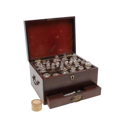 1191 - AN EARLY 19TH CENTURY MAHOGANY APOTHECARY BOX AND CONTENTS. the rectangular lift top box revealing a... 