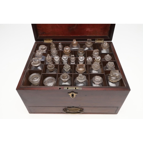 1191 - AN EARLY 19TH CENTURY MAHOGANY APOTHECARY BOX AND CONTENTS. the rectangular lift top box revealing a... 