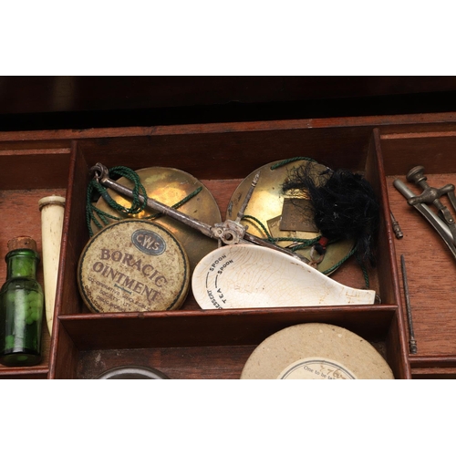 1191 - AN EARLY 19TH CENTURY MAHOGANY APOTHECARY BOX AND CONTENTS. the rectangular lift top box revealing a... 