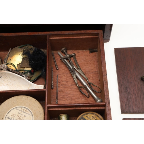 1191 - AN EARLY 19TH CENTURY MAHOGANY APOTHECARY BOX AND CONTENTS. the rectangular lift top box revealing a... 