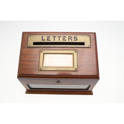 1198 - AN EDWARDIAN BRASS MOUNTED MAHOGANY LETTER BOX. the hinged lid with paper inset 'Post Leaves' times ... 