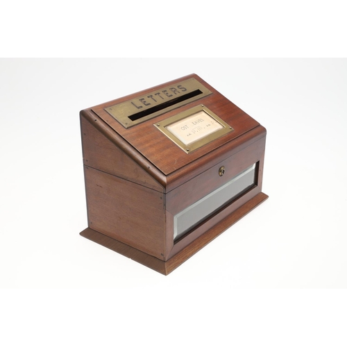 1198 - AN EDWARDIAN BRASS MOUNTED MAHOGANY LETTER BOX. the hinged lid with paper inset 'Post Leaves' times ... 