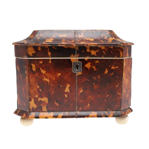 1201 - A GEORGE III TORTOISESHELL AND IVORY TEA CADDY. of octagonal casket form, the hinged lid enclosing t... 