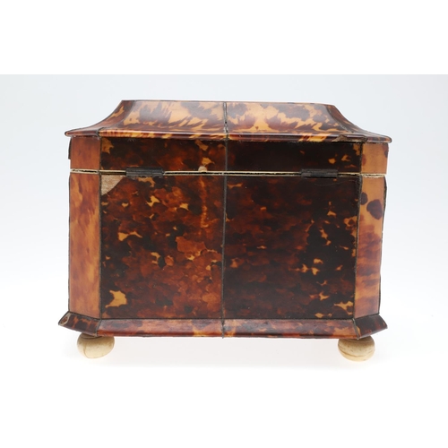 1201 - A GEORGE III TORTOISESHELL AND IVORY TEA CADDY. of octagonal casket form, the hinged lid enclosing t... 