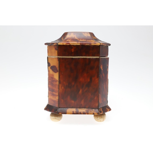 1201 - A GEORGE III TORTOISESHELL AND IVORY TEA CADDY. of octagonal casket form, the hinged lid enclosing t... 