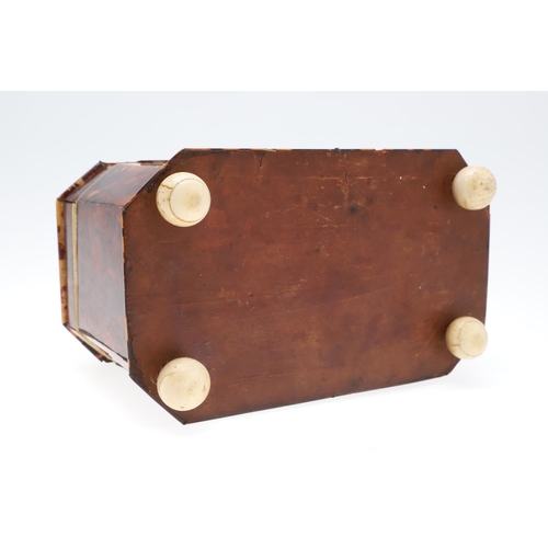 1201 - A GEORGE III TORTOISESHELL AND IVORY TEA CADDY. of octagonal casket form, the hinged lid enclosing t... 