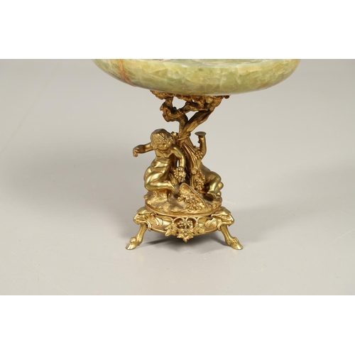 1206 - A CHRISTOPHLE NEOCLASSICAL ORMOLU AND ONYX TAZZA. the onyx dish upon a naturalistically modelled fru... 