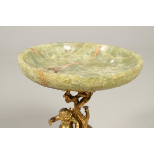 1206 - A CHRISTOPHLE NEOCLASSICAL ORMOLU AND ONYX TAZZA. the onyx dish upon a naturalistically modelled fru... 