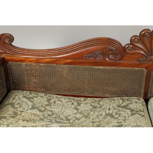 1207 - A REGENCY MAHOGANY CAMPAIGN SOFA. with carved scrolling crest rail and central multiple scroll 'fan'... 