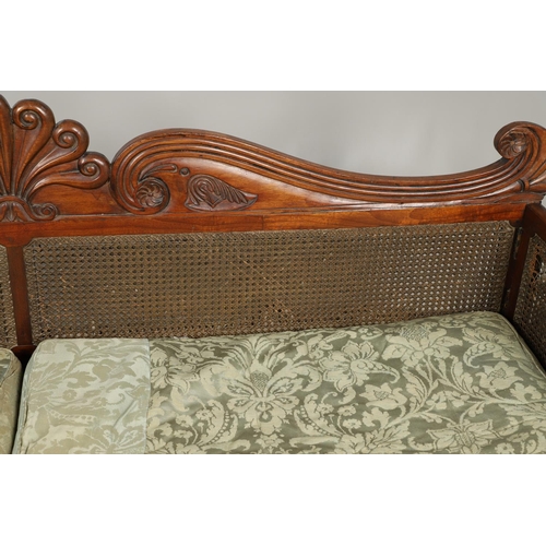 1207 - A REGENCY MAHOGANY CAMPAIGN SOFA. with carved scrolling crest rail and central multiple scroll 'fan'... 