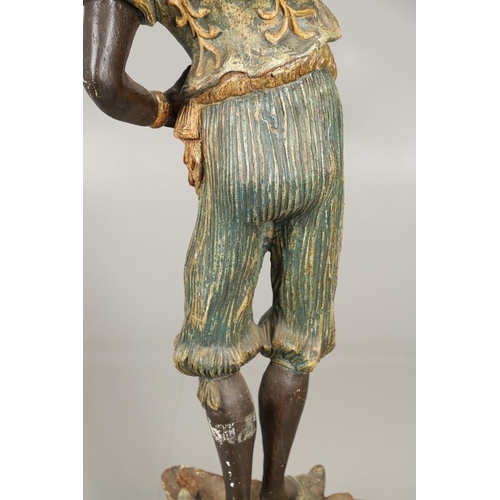 1210 - AN ITALIAN POLYCHROME PAINTED BLACKAMOOR TORCHERE. 20th century, modelled as a female, carved with t... 