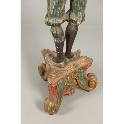 1210 - AN ITALIAN POLYCHROME PAINTED BLACKAMOOR TORCHERE. 20th century, modelled as a female, carved with t... 