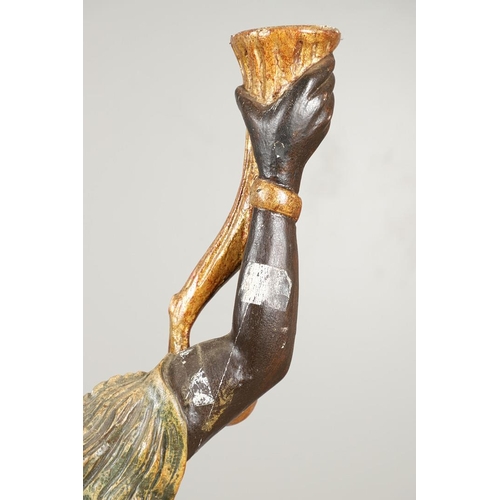 1210 - AN ITALIAN POLYCHROME PAINTED BLACKAMOOR TORCHERE. 20th century, modelled as a female, carved with t... 