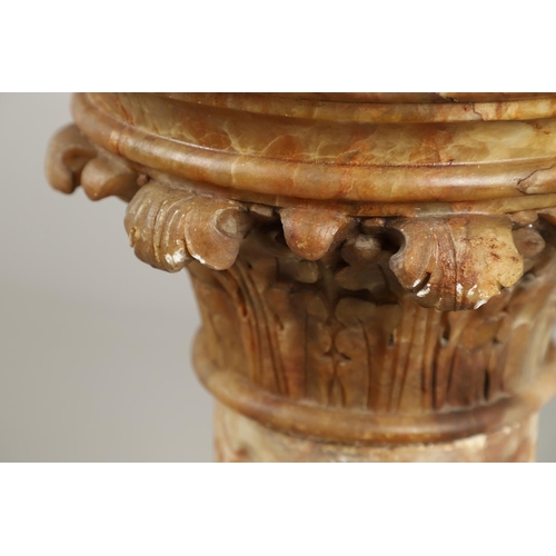 1211 - A 19TH CENTURY CARVED ALABASTER COLUMN. the circular top with carved acanthus leaf capital upon a fl... 