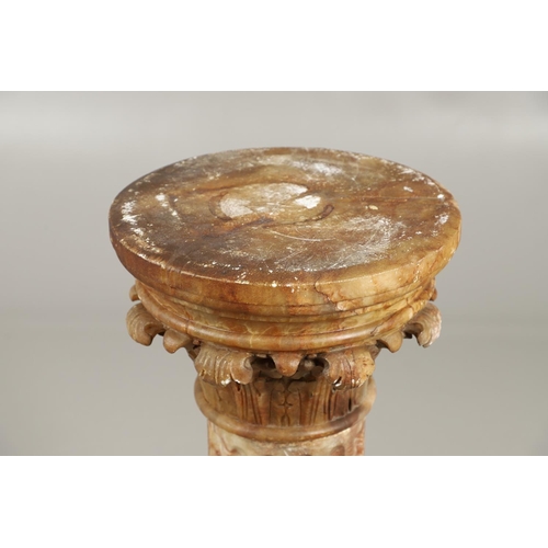 1211 - A 19TH CENTURY CARVED ALABASTER COLUMN. the circular top with carved acanthus leaf capital upon a fl... 