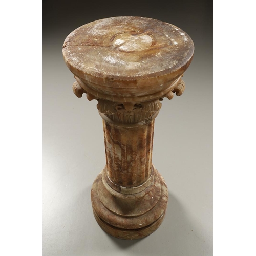 1211 - A 19TH CENTURY CARVED ALABASTER COLUMN. the circular top with carved acanthus leaf capital upon a fl... 