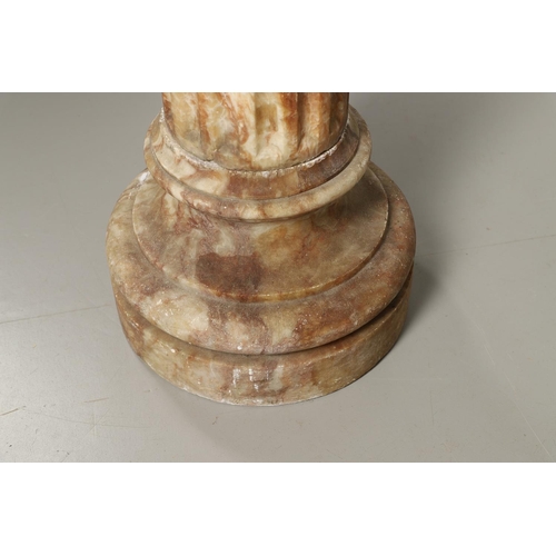 1211 - A 19TH CENTURY CARVED ALABASTER COLUMN. the circular top with carved acanthus leaf capital upon a fl... 