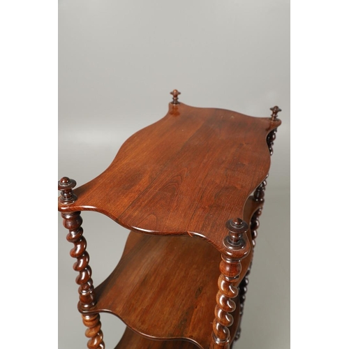 1214 - A VICTORIAN ROSEWOOD FOUR TIER WHATNOT. the serpentine shaped shelves on barley twist supports with ... 