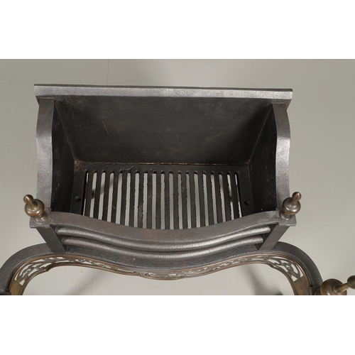 1215 - AN ADAMS STYLE CAST IRON AND BRASS FIRE BASKET. of serpentine form with wrought rear supports, pierc... 